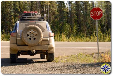 dirty fj cruiser leaving haul road