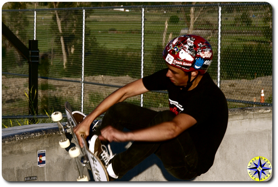 boy skateboarding pool