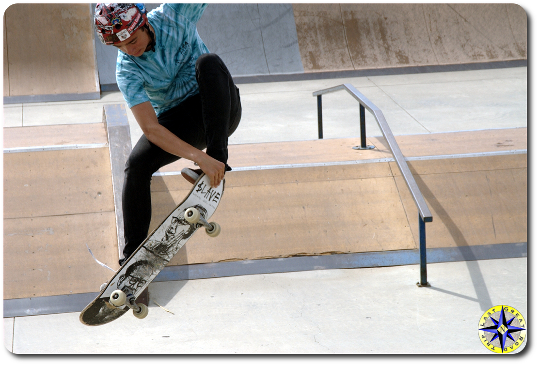 skateboarding grabbing board