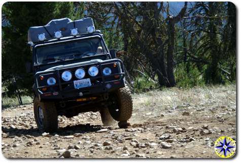 defender 90 backing down 4x4 trail