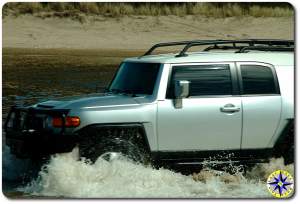 silver fj cruiser fording water