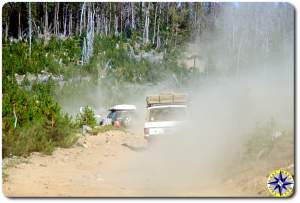 land rover driving dusty 4x4 trail