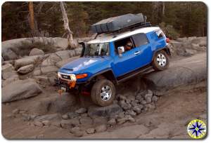 toyota voodoo blue fj cruiser roof top tent rubicon trail boulders