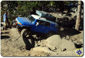 fj cruiser roof top tent climbing boulder rubicon trail