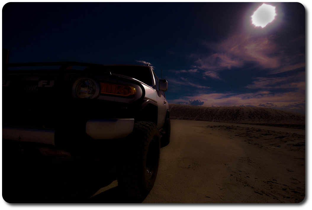 silver fj cruiser sandy desert road