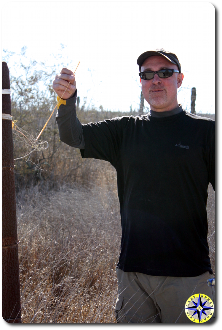 man holding baja 1000 race marker