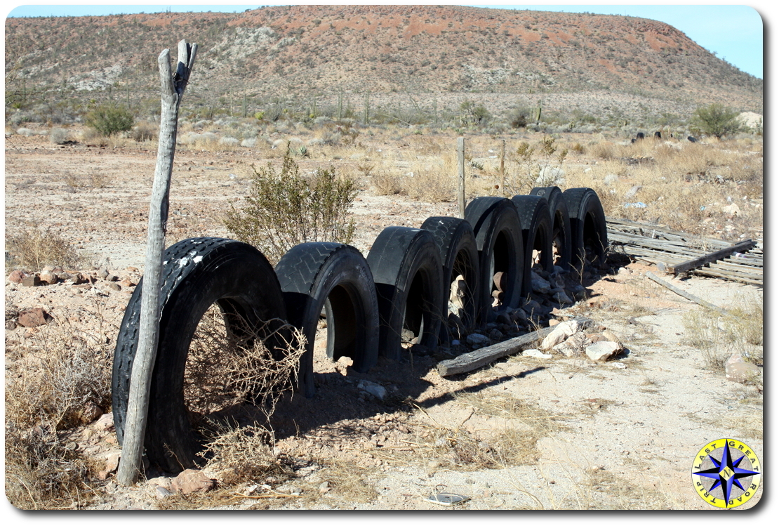 half burried tire fench baja mexico