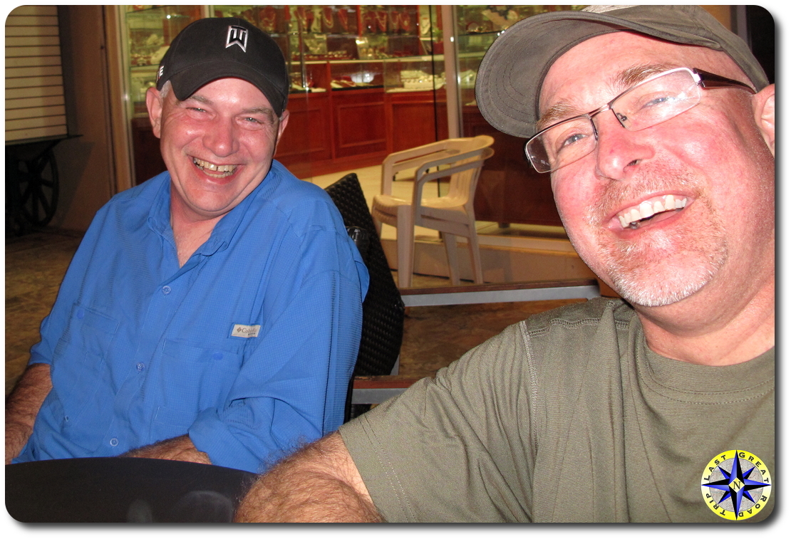 two men laughing cabo san lucasstreets