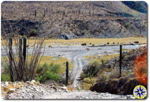 baja mexico road through dry river bed