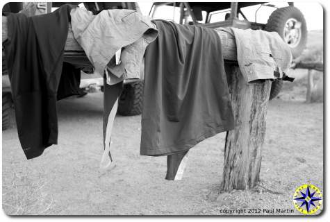 camp laundry drying on posts