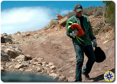 man carrying recovery gear