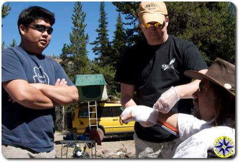 wilderness first aid splinting injured man arm