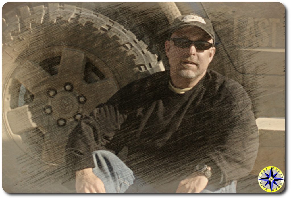 paul - sketch man sitting next to truck tire