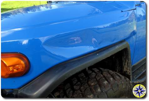 fj cruiser dented fron fender