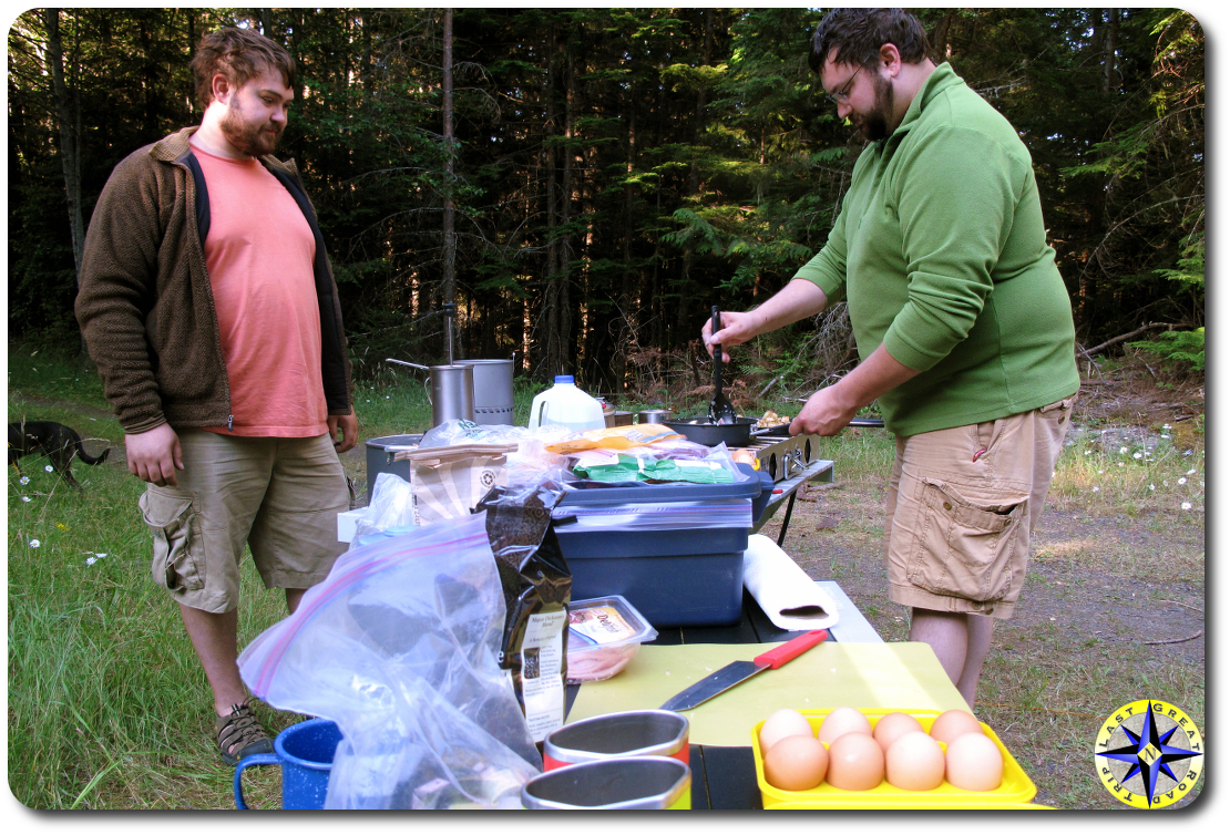 men cooking camping breakfast