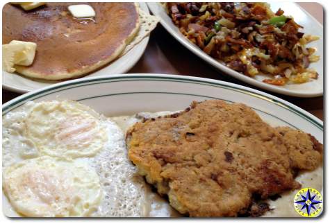 chiken fried steak and hash browns and pancake breakfast