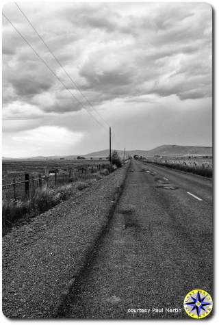 storm clouds over endless highway utah