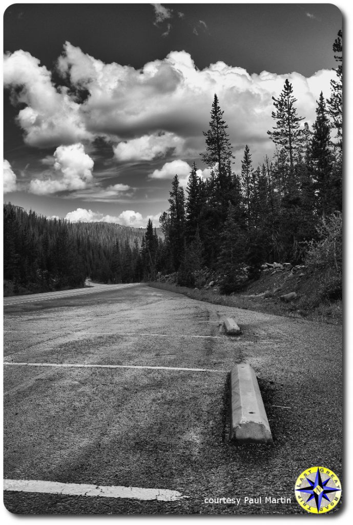 Storm clouds over utah mountain rest stop parkin lot