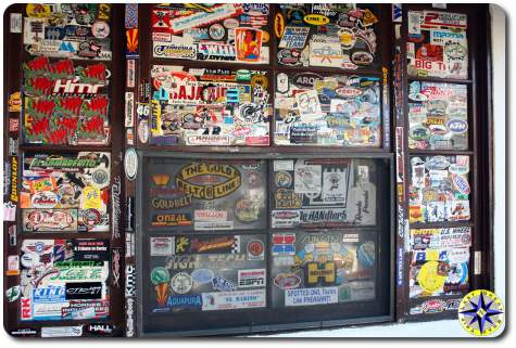 stickers covered window at mikes sky rancho