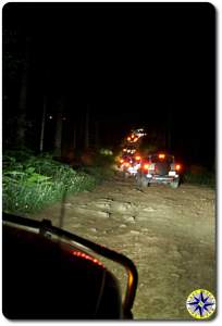 fj cruisers on 4x4 trail at night
