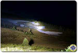 lighting up snow field at night