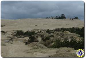 dark clouds florence sand dunes