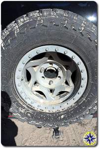 sand covered spare tire toyo open country mt