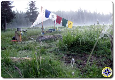 sunrise camp prayer flags minimalist primitive camping